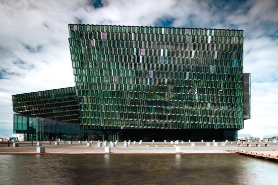 South façade clad in three-dimensional quasi-bricks.