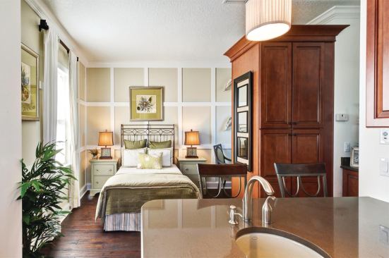 The second-floor guest suite is a cozy place to stay and offers plenty of privacy, complete with double-sized shower and kitchenette. Its separate entryway is reached via a staircase from the courtyard.