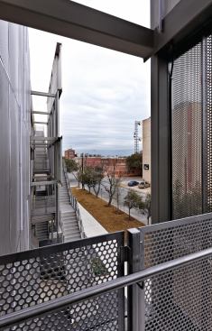Framed views of brick buildings in historic downtown.