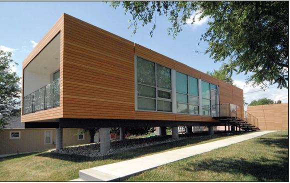 Modular 3, Studio 804’s 2006 project, was prefabricated in six units, trucked to Kansas City, Kan., and assembled on steel skids supported by concrete piers. East-facing windows fill the interior with natural light, giving the bamboo floors a warm glow.