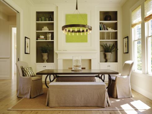 Moving casual living spaces to the rear freed the house's original first-floor rooms for more formal uses. 

