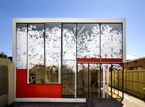 The stickers’ organic shapes produce a dappled pattern of light, much like the shade of real trees would do.