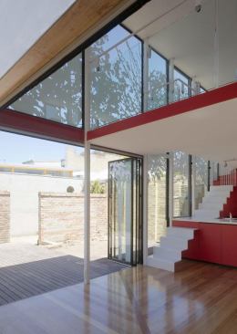 The clean lines and rectilinear form kept the project on budget and generate open airy gathering spaces inside and out.