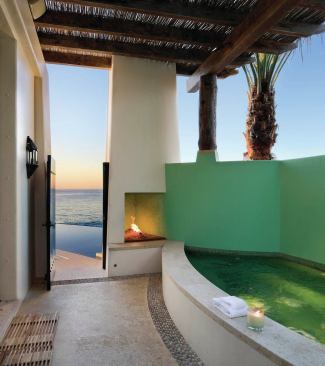 Bursts of color punctuate the home's Spanish vernacular, making for a balance of modern and traditional.