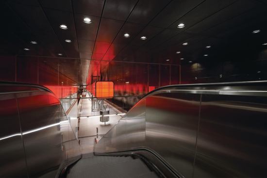 The light boxes are a visual reference point throughout the station with its 30-foot-high ceilings.