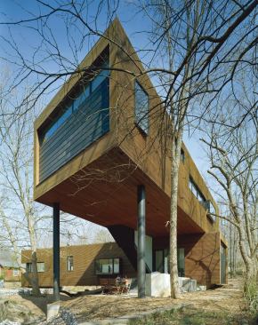 Elevating the second story carved out almost 1,000 square feet for terraces and an outdoor kitchen.

