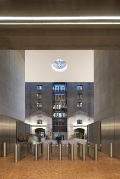Once students and faculty pass through the entrance, they are greeted by what’s referred to as the East-West link, a vast atrium space that provides the transition between the building centuries.
