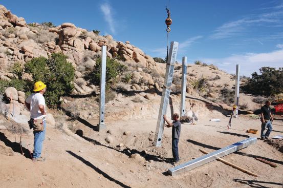 The frame is lightweight enough to be assembled with minimal machinery and a small construction crew.