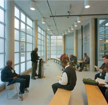 Residents can gather in several public spaces to listen to a presentation in the mission's main meeting space (far bottom left) or in the main cafeteria (bottom middle), which can seat 600 and serves 1,800 meals three times a day. Quiet reflection is allowed in the chapel (bottom, near left), which is also used for regular religious services.