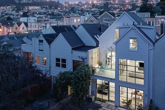 The space inside is like a time capsule moving visitors from traditional to modern. The rear façade adds space, light, and garden access.