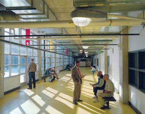 The Yellow Brick Road is the central artery of the mission, connecting living, work, eating, and meditation spaces. The corridor is wide enough to allow socializing and impromptu gatherings, as well as to set up tables from which to distribute informational flyers on subjects ranging from getting a job to healthy living.