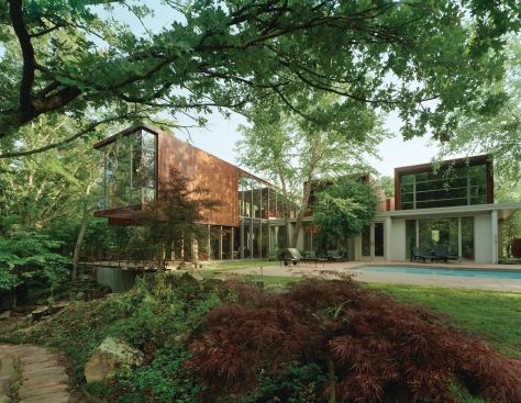 A respectful reinterpretation of an existing, fire-damaged residence in Johnson, Ark.