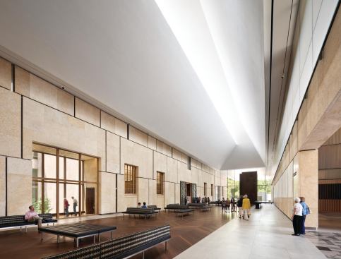 Architects Tod Williams and Billie Tsien wanted to make sure that the new Barnes was infused with natural light. To that end, one of the main architectural features of the project is the Light Court. Here, museum guests make the transition from the public areas to the galleries. The angled ceiling—the light canopy—captures southern light entering through a huge light box that runs the length of the building and casts it down into the space. The natural light combines with 28W T5 fluorescents and washes the perimeter walls, helping to give the space a sense of scale—and visitors a reference to the time of day.