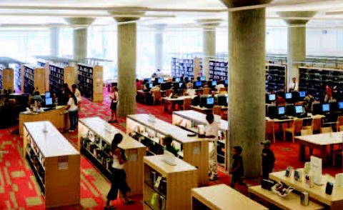 To minimize visual clutter, the lighting designers devised custom T-shaped brackets fitted with T5 fluorescents and mounted them atop every other book stack to provide diffused downlight illumination along the circulation paths between stacks. Controlled by occupancy sensors, the fixtures are ultra-efficient.