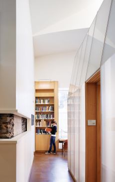 The architects left signs of the building as it existed before—framed reveals in the new walls allow students to see through to the original stone walls of the 1840s structure.