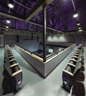 A catwalk above the desk leads to the Listening Space, a perfect cube, where visitors see presentations about the Holocaust and the exhibits they are about to enter.