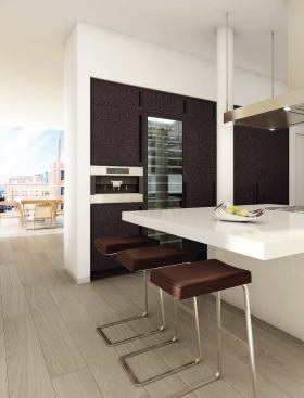 The apartment layouts change slightly with every unit because of the building's shifting floor plates. Interior architect Thomas Juul- Hansen focused on giving each space clean, high-end finishes, including stone slab counters and Miele appliances. His approach was to do the basic fixtures right the first time, so that buyers will not feel compelled to rip out a kitchen or bathroom and start afresh.
