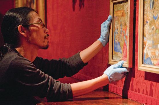 Art was carefully returned to its original location on the walls after work was completed.