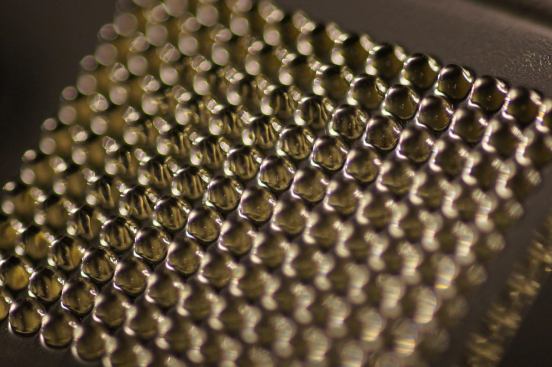 This array of spherical micro lenses can help create effects such as collimation, color mixing, light diffusion and diverging.