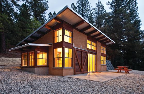 An energy-efficient, low-maintenance building shell and both passive and active solar energy systems yield a building that can fend for itself in a remote location subject to extreme weather.