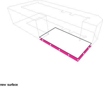 A new concrete surface was laid over a net to cover oil and dirt from the site's past as a mechanic's garage.