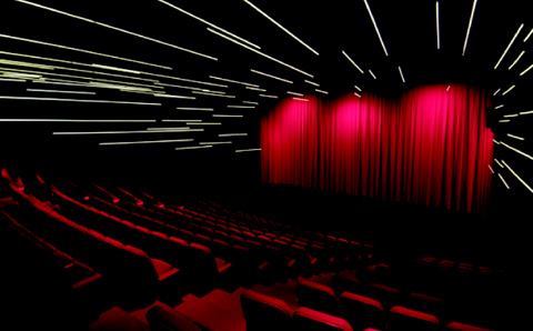 The ordered pattern of light gives way to a dynamic arrangement of white 3500K linear LED strips in the 295-seat theater.