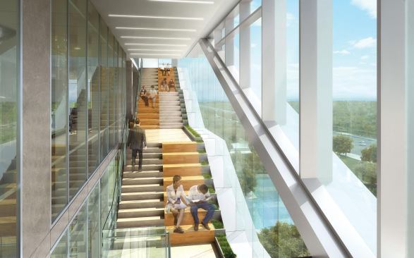 Interiors feature perimeter stairs, integrated seating and gathering spaces with views to the surrounding, picturesque landscape.