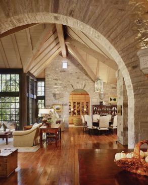 Herd Kitchen, Austin, TexasArchitect: Paul Lamb Architects, Austin; General contractor: Don Crowell Builders, Austin; Interior designer: Fern Santini Design, Austin



A stone wall helps differentiate the great room from the kitchen, while its dramatic archway helps unify the two spaces.