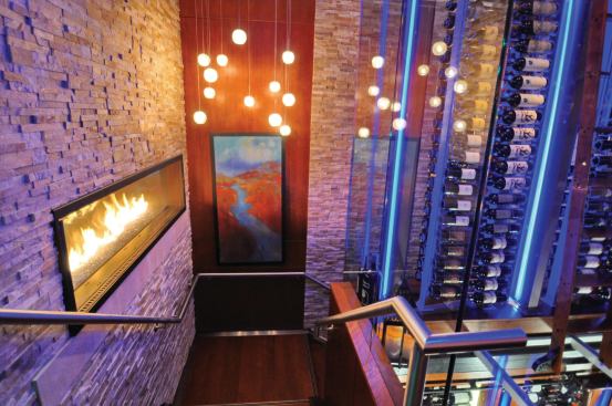 The Cool Pack installation allows the glass in front of the fireplace and the metal handrail to stay cool to touch.