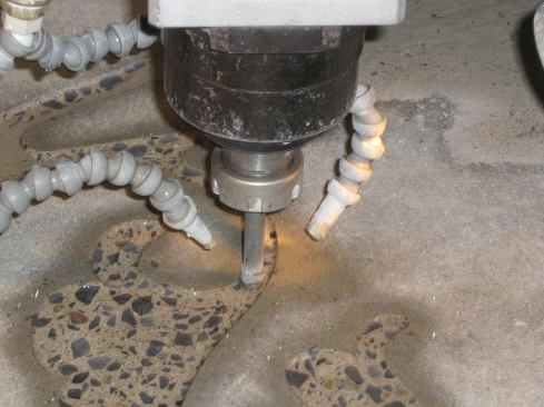 The DEVA in action, engraving a concrete floor.