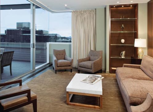 Comfortable artist-in-residence quarters connect to four upper-level private studios.