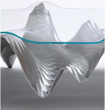 Product: Asymptote's Ivo table

Manufacturer: Meta

Website: madebymeta.com

Asymptote's topographical table combines a steel-alloy base and slumped glass top.