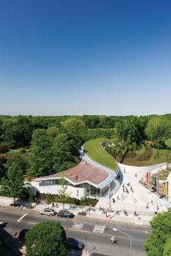 Although the roof plane of the visitor center  is composed of two different materials to distinguish the pavilions on the urban and garden edges of the site, the surfaces are united by a theme: “We have two green roofs,” Marion Weiss says. “One is copper [which will oxidize] … and the other is planted.”