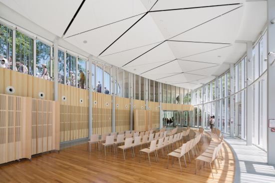 Event space, with a view through the clerestory to the roof terrace above.
