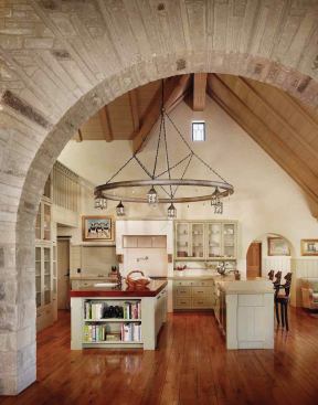 In this lodge-style west Texas home, the primary cook wanted to be certain that the kitchen was in the center of the floor plan. She also wanted her guests to be facing the kitchen, even when they were sitting and watching TV in the adjoining great room.


Herd Kitchen, Austin, Texas; Architect: Paul Lamb Architects, Austin; General contractor: Don Crowell Builders, Austin; Interior designer: Fern Santini Design, Austin