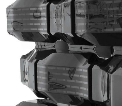 In the Drape Wall system, vacuum-formed plastic bricks snap together on an aluminum frame, creating the rainscreen exterior of this housing prototype.