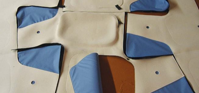 INTERIOR FELT "DRAPE"
Preliminary sketches for the felt drape system have been manufactured into large-scale mockups. There are voids in the felt to give access to the blue vapor barrier, and zippered pockets so that residents can actively use the surface for storage.