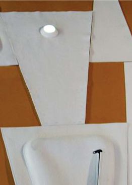 In addition to storage pockets, the felt quilt in Cloak Wall incorporates systems such as LED lights and wires for radiant heating and cooling, making it a much more active part of the interior environment than previous iterations were.