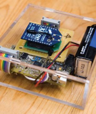 Depending on the location and planned duration of deployment, the input nodes or sensors have larger or smaller batteries and casings. This smaller version shows a sensor module connected to a radio module that transmits the collected data to computers and output nodes.