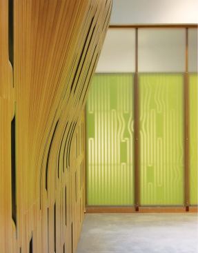 The process of manufacturing and assembling the east wall (at left) is highlighted by the adjacent wall panels (at right), which display the tooling paths for each MDF piece used in the east wall's fabrication.