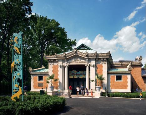 The façade of the historic Lion House was restored using the same materials-including limestone, Roman ironspot brick, copper roofing, and terra-cotta cornice pieces-as the original Heins and LaFarge design.