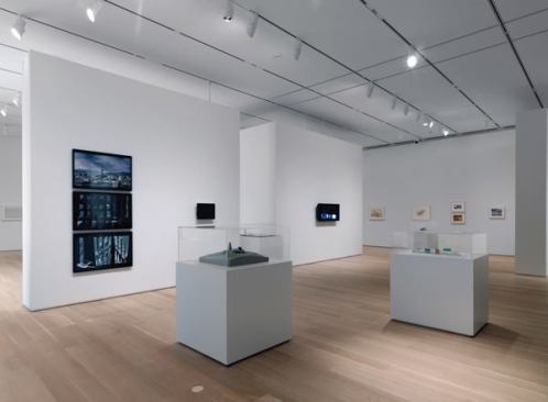 Recessed tracklighting in the Art Institute of Chicago's new Modern Wing, shown here in the Architecture and Design Gallery, reinforces the orthogonal grid of the new addition and is architect Renzo Piano's reference to Chicago's urban and architectural development since the Great Fire of 1871. ?  Photo Credit: Dave Jordano/Courtesy The Art Institute of Chicago