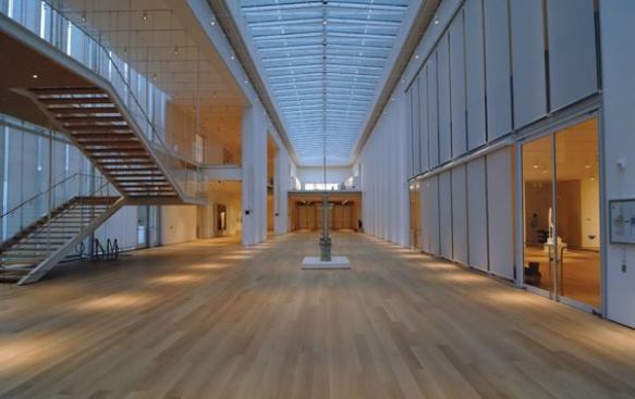 Inside, the two-story-tall, 300-foot-long Griffin Court serves as the main circulation artery, linking public areas to the galleries. ? Photo Credit: Charles G. Young, Interactive Design Architects/Courtesy The Art Institute of Chicago