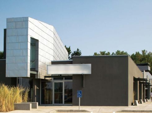 Brown's first foray into strip-mall design and development was 120 Blondo, an office/retail center completed in 2004 and listed in The Phaidon Atlas of Contemporary World Architecture. Like all of Brown's malls, it is fully leased.