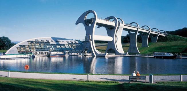 PROJECT: Falkirk Wheel

LOCATION: Falkirk, Scotland

DATE: 2002

DETAILS: Inspired in part by Legos, Tony Kettle’s design for the Falkirk Wheel, a rotating boat lift that links two canals, has also been compared to a Celtic two-headed axe. The Wheel has become one of Scotland’s most popular tourist attractions.