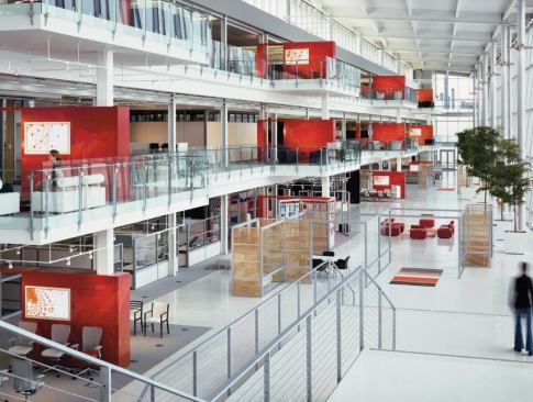 One Haworth Center, Holland, Mich. 

When your client is Haworth, the furniture and workspace experts, you can bet that they will keep an eye on A/V integration. Perkins+Will and Eva Maddox leaned on their integrators to make sure that any equipment blends seamlessly into the spaces. The atrium is dotted with "organic workspaces" that allow for impromptu meetings with complete access to Haworth's central content server.