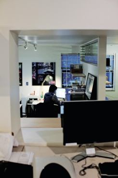 Before his additions, the studio was a one-story concrete block located at the foot of the Burrard Bridge, a dramatic, Art Deco structure.