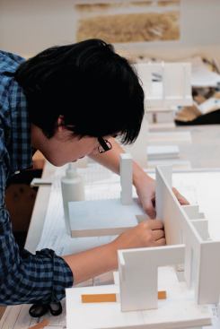"It's more like a school," Thom says of his studio. "It's really not an office."