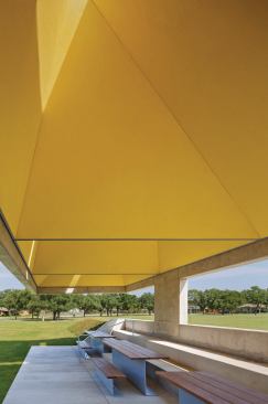 Brightly-colored lightwells above the seating area. 