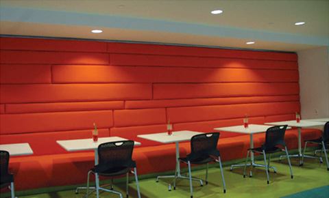 Sophisticated interiors in the cafeteria, winter garden, and elevator corridors provide a decorative counterpoint to the open office areas where a comprehensive daylight harvesting control system keeps the space illuminated by night and day.